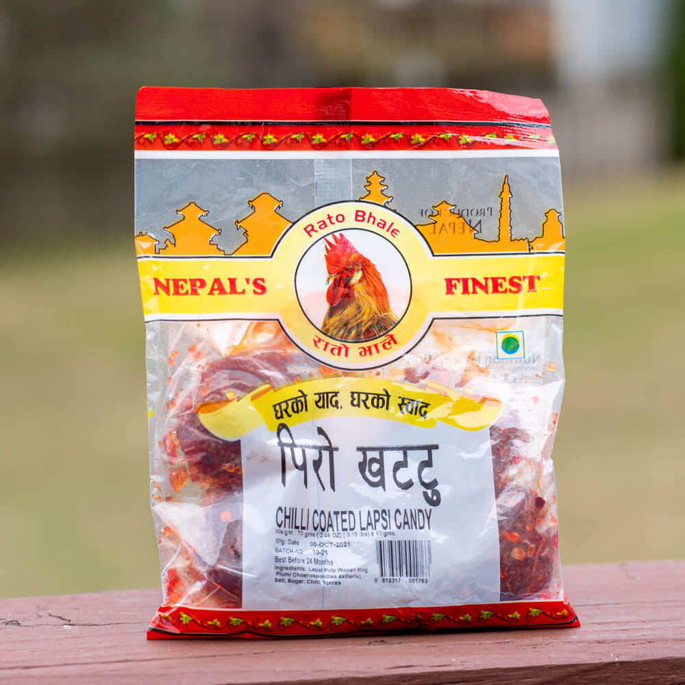 Piro Khattu Titaura (Chilli coated lapsi candy)