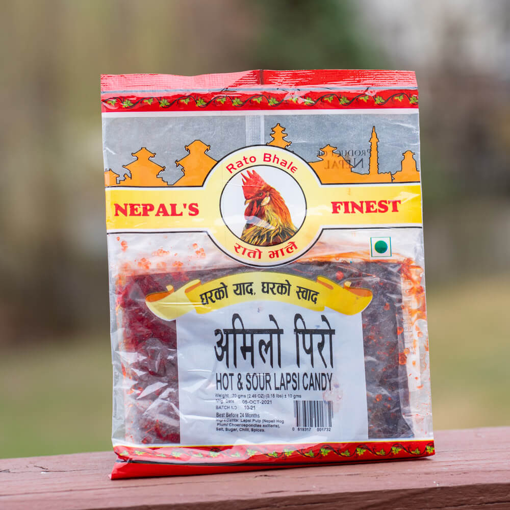 Amilo Piro Titaura (Hot and sour lapsi candy)